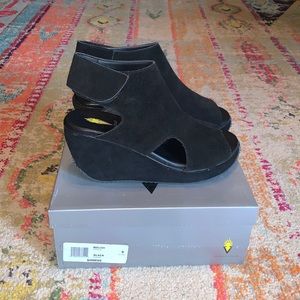 Volatile black suede sandal.